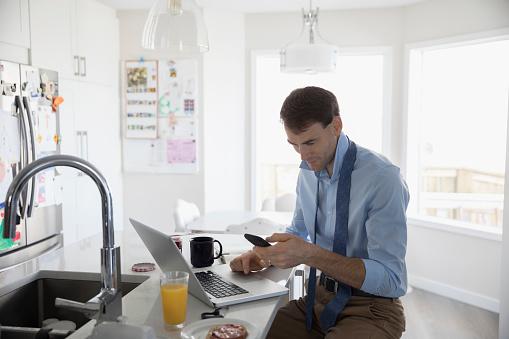 man looking at phone